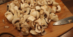 Sliced Mushrooms on a cutting board